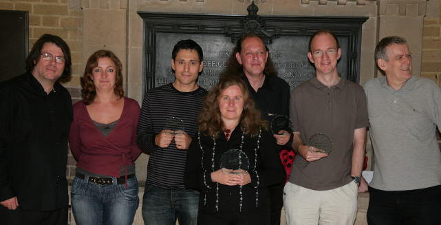 Championship presentation group. Flanked by co-organisers Roland Herrera (left) and Ian Tarr (right) are Cecilia Sparke, Michael Soerensen, Simonetta Herrera, Julian Fetterlein and Lawrence Powell